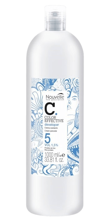 A bottle of Nouvelle Developer Color Effective cream developer for hair coloring, indicating different volumes (5, 10, 20, 27, 30, 40 Vol).