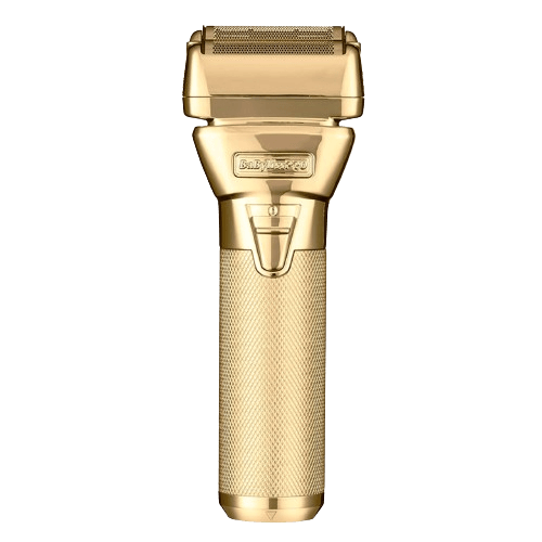 A gold-colored BaByliss FXONE electric shaver with an ergonomic all-metal housing and a pivoting foil head.