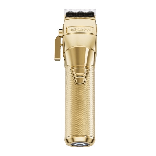 A gold-colored BabylissPro FXONE cordless hair clipper with a metallic finish and a black rubber grip.