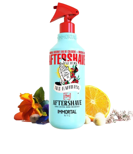 Bottle of Immortal NYC aftershave with floral and fruit elements on a white background