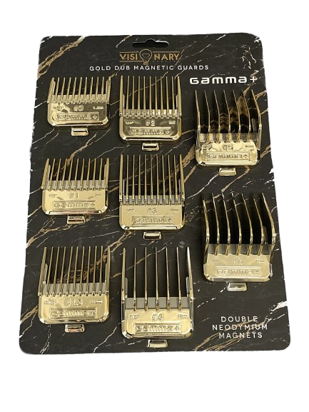 A set of Gamma+ brand gold-colored hair clipper guards, packaged in a magnetic closure pouch.