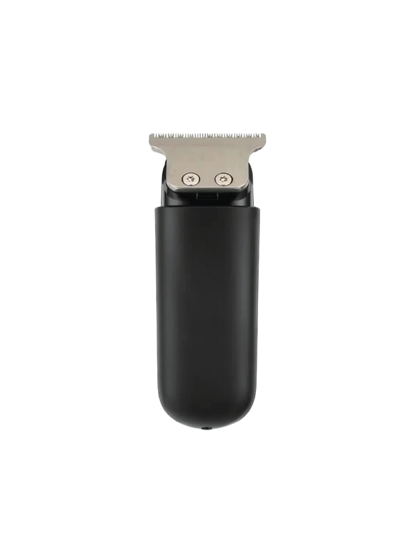Black grooming tool with silver blade on a white background