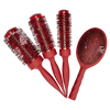 Set of red hairbrushes on a white background
