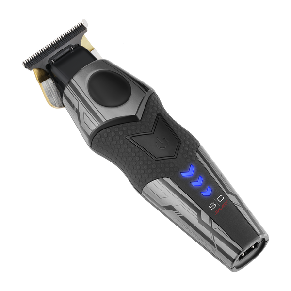 A cordless electric hair trimmer shown at a diagonal angle on a solid white background. The clipper features a black and dark gray textured handle with a circular power button, a black cutting head with gold-colored blades, and illuminated blue LED indicator lights on the side.