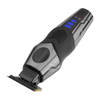A handheld electric hair trimmer shown at an angle on a plain white background. The clipper has a black and dark gray body with a textured grip, a circular black button, blue LED indicator lights, and a metal cutting blade with a small gold accent.