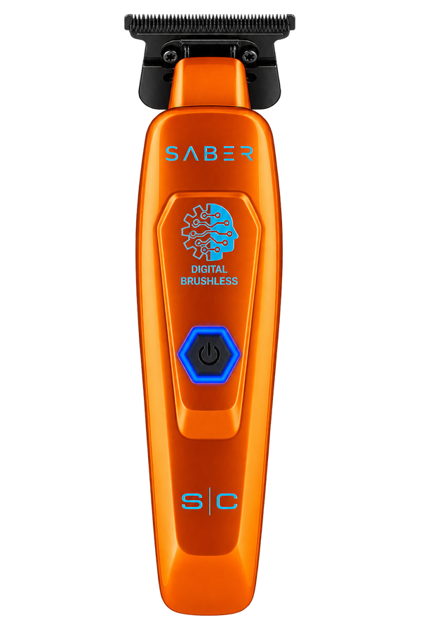 An orange StyleCraft Saber Hair Trimmer with a black cutting head and blue accents, including the brand name 'SABER' and 'DIGITAL BRUSHLESS' text on the front.