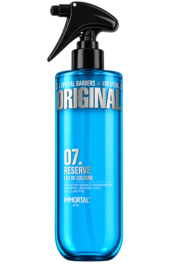 A bottle of IMMORTAL NYC Original 07. Reserve Eau de Cologne with a black spray trigger top and a bright blue translucent body, shown on a plain white background.