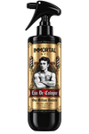 A black spray bottle of Immortal NYC One Million Boilers Eau De Cologne from the Signature Collection, featuring a vintage-style label with a tattooed man and gold ornamental borders.