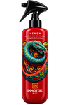 A red spray bottle of Immortal NYC Venom Original Eau de Cologne with a black trigger sprayer and a colorful snake illustration on the front.