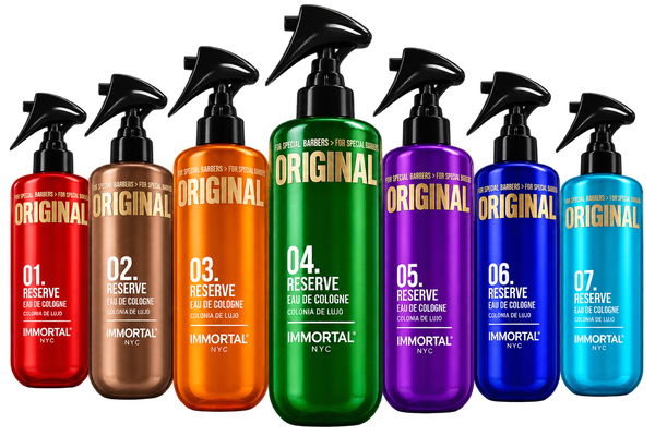 Immortal NYC  Reserve Aftershave in different vibrant colors lined up on a white background. The bottles are red, bronze, orange, green, purple, blue, and light blue, all with black spray tops and featuring the text 'IMMORTAL NYC' and 'ORIGINAL'.