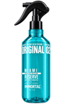 A 500ml spray bottle of Miami Reserve Aftershave in Original 02, featuring a translucent bright blue body and a black trigger spray mechanism, with white text on a clean white background.