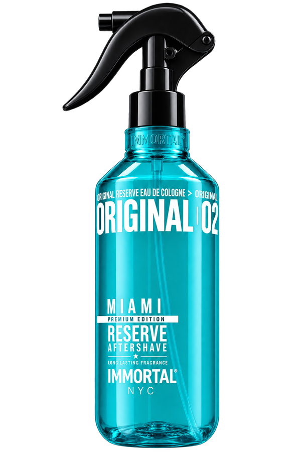 A 500ml spray bottle of Miami Reserve Aftershave in Original 02, featuring a translucent bright blue body and a black trigger spray mechanism, with white text on a clean white background.