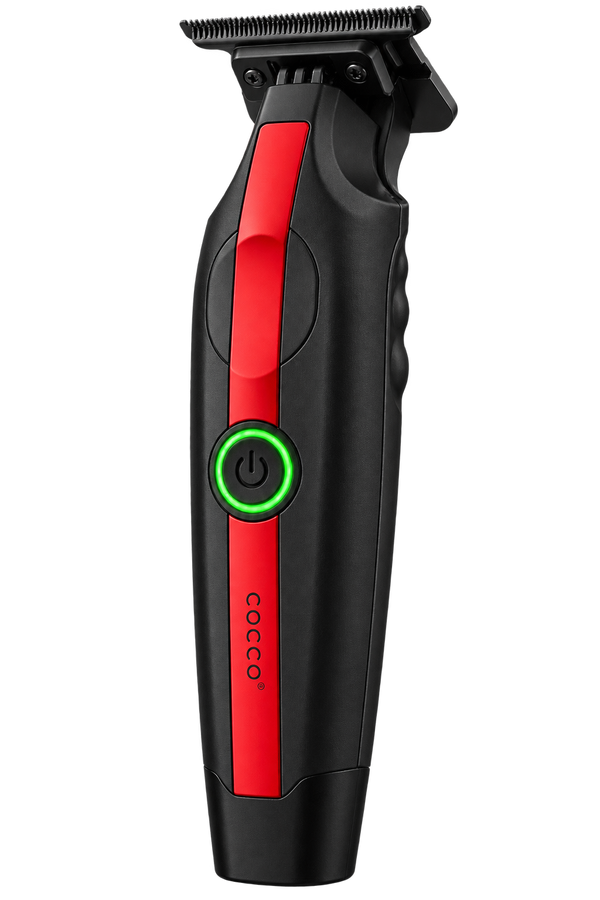 A cordless hair trimmer with a black and red handle, featuring a glowing green power button and the brand name 'cocoon' printed vertically on the side.