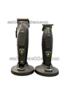 Two black hair clippers with visible branding on a white background