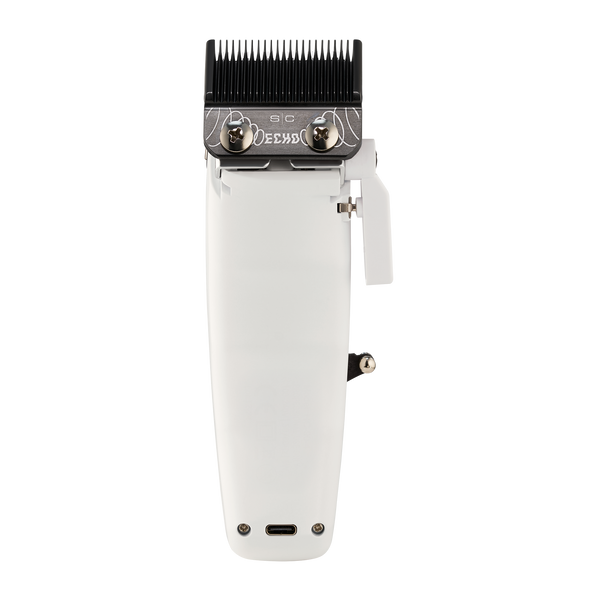 Hair clipper with comb attachment on a white background