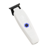 White grooming tool with black comb on a white background