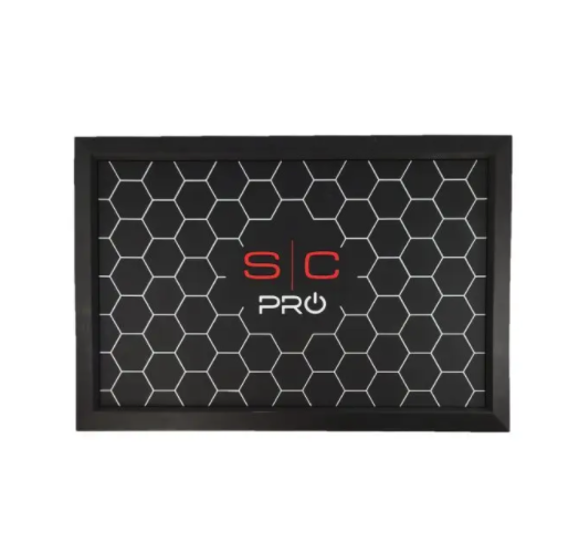 Black mat with honeycomb pattern and 'S/C Pro' logo on a white background