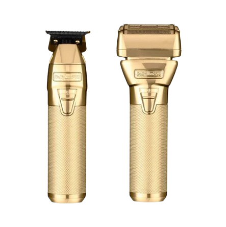 Gold electric shaver and trimmer on a white background
