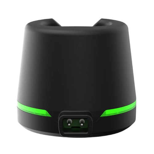 Black device with a green light on a white background