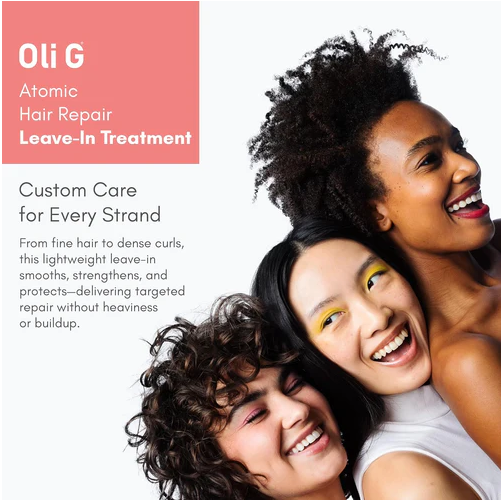 Advertisement for Oli G Atomic Hair Repair Leave-In Treatment featuring two women with curly hair.