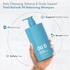 Oli G shampoo bottle held by a hand with product features highlighted on a white background