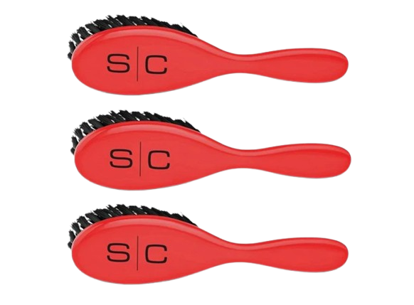 Three red hairbrushes with black bristles, arranged vertically on a plain white background. Each brush has a black 's/c' logo on the side.